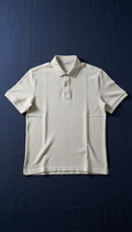 Ecru linen polo shirt with mother-of-pearl buttons